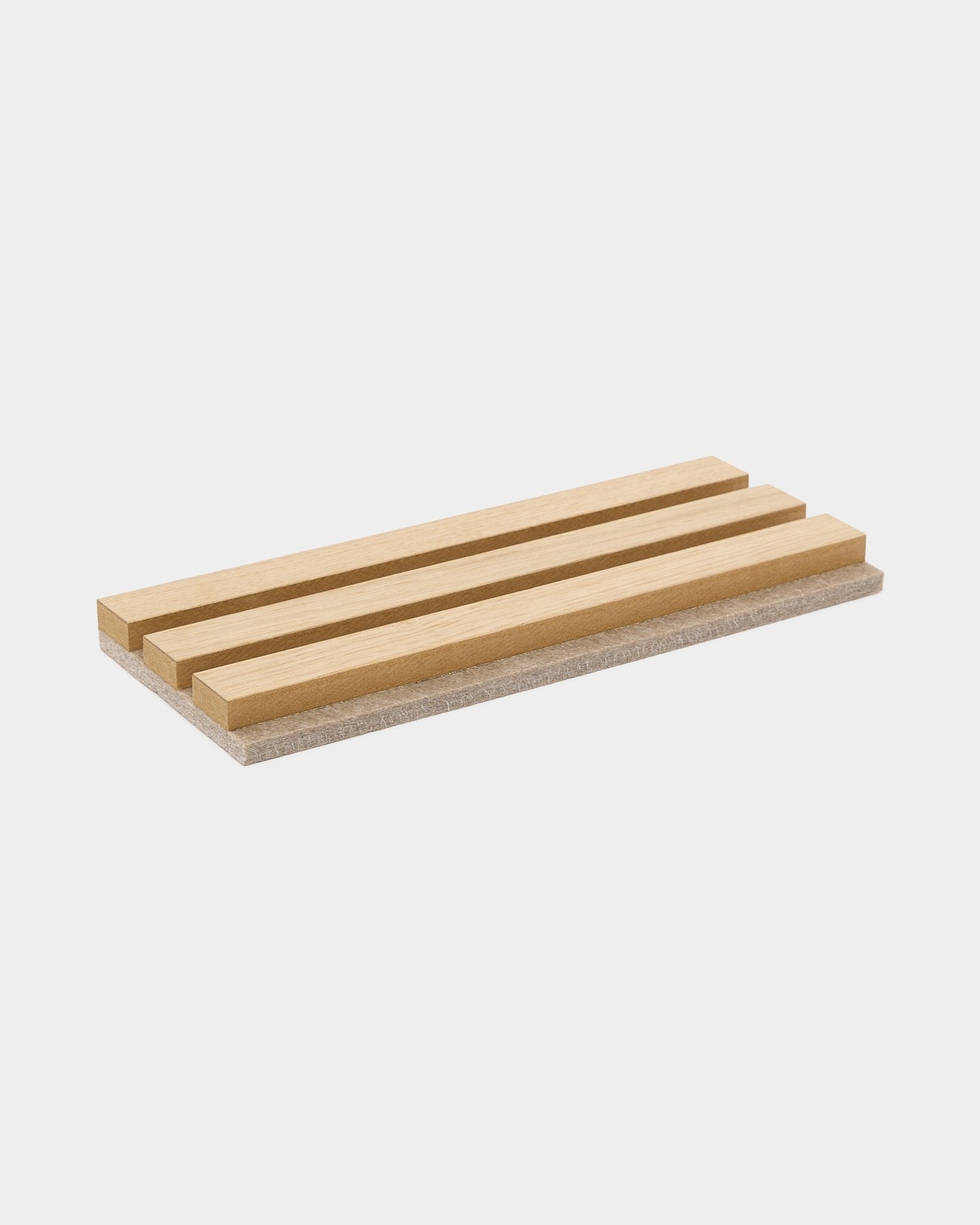 WoodUpp color samples: Rectangular wooden soap dish with three raised wooden slats on a light base, designed to keep bar soap dry.