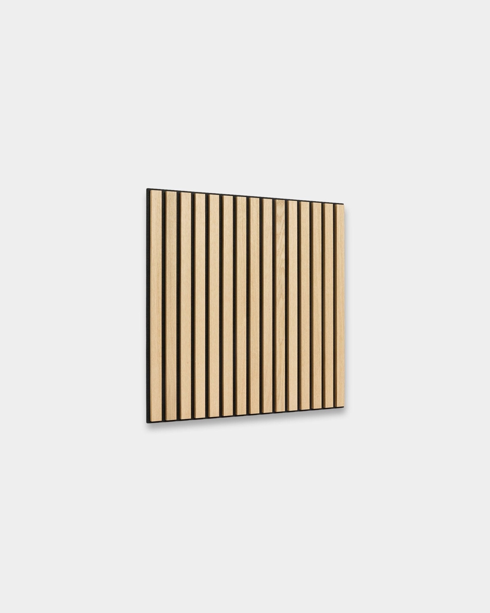 WoodUpp Akupixel acoustic panel in Classic Oak with black felt, 60x60 cm, featuring evenly spaced slats and minimalist Nordic design.