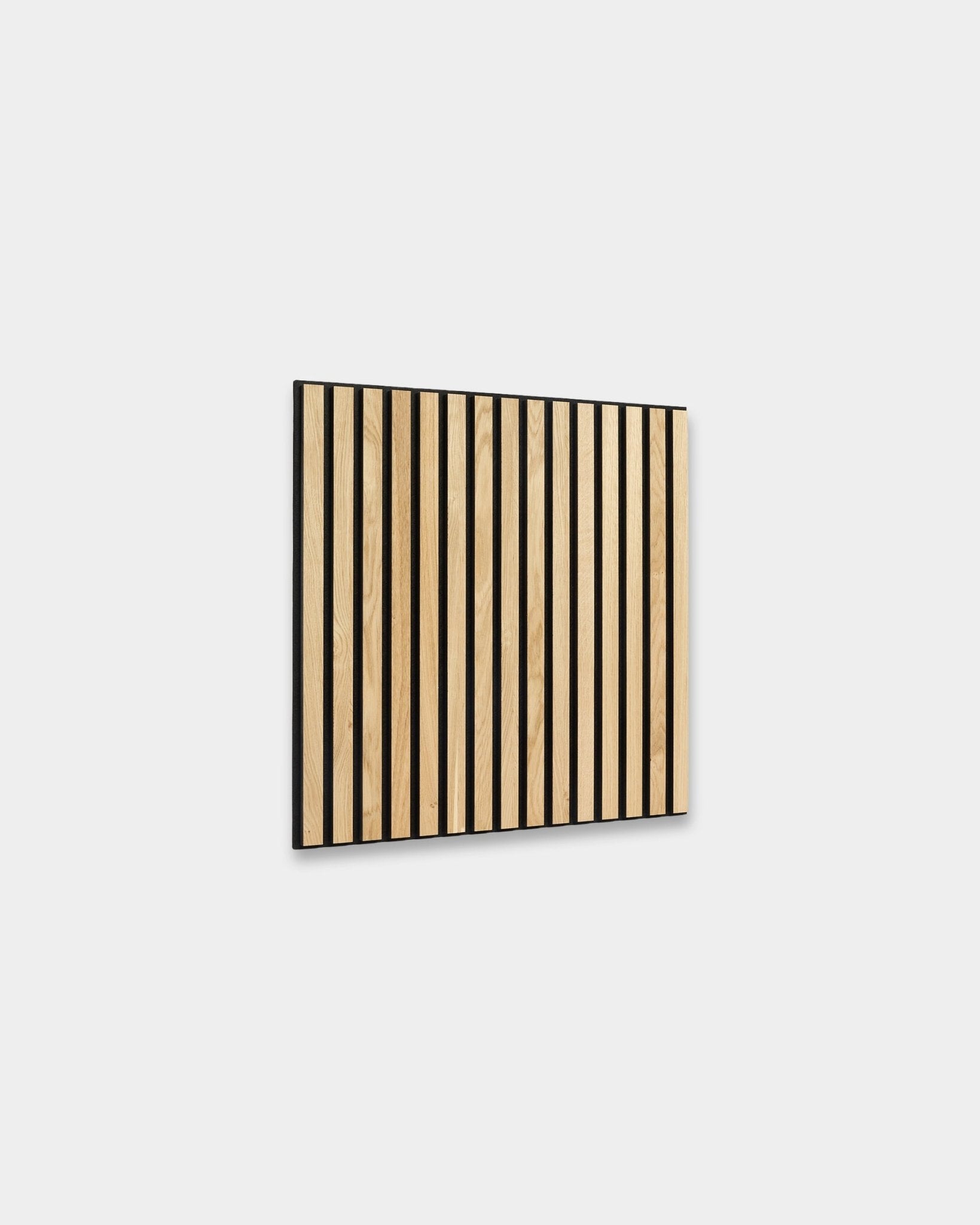 WoodUpp Akupixel Rustic Natural Oak acoustic panel, 60x60 cm, with vertical oak and black slats on a light gray background for Nordic interiors.