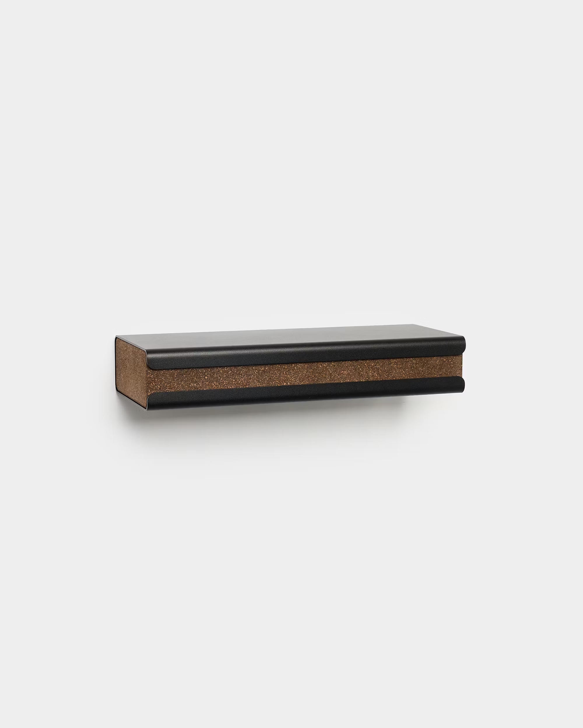 Minimalist WoodUpp CREATE floating wall shelf in black with cork accent, designed as an accessory for Akupanel, shown mounted on a white background.