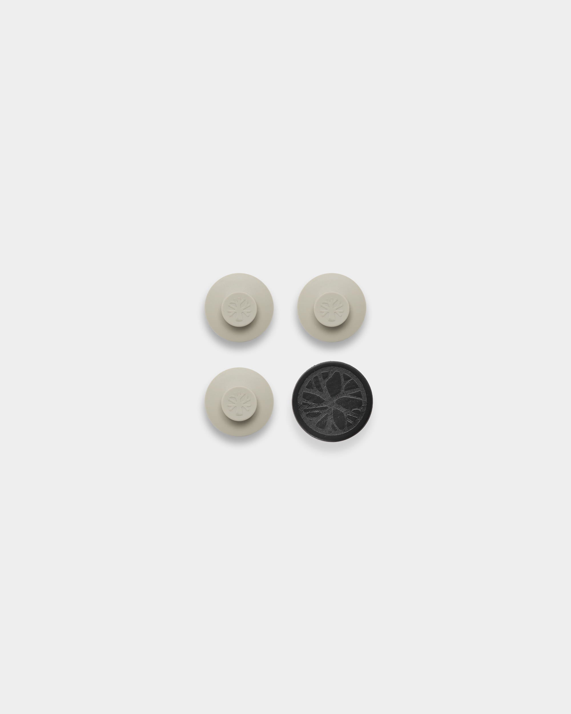 WoodUpp Dupps set: three beige round acoustic accessories with circular patterns and one tool, arranged for wall mounting on a white background.